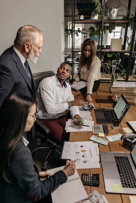 Team collaborating on a structured workflow diagram